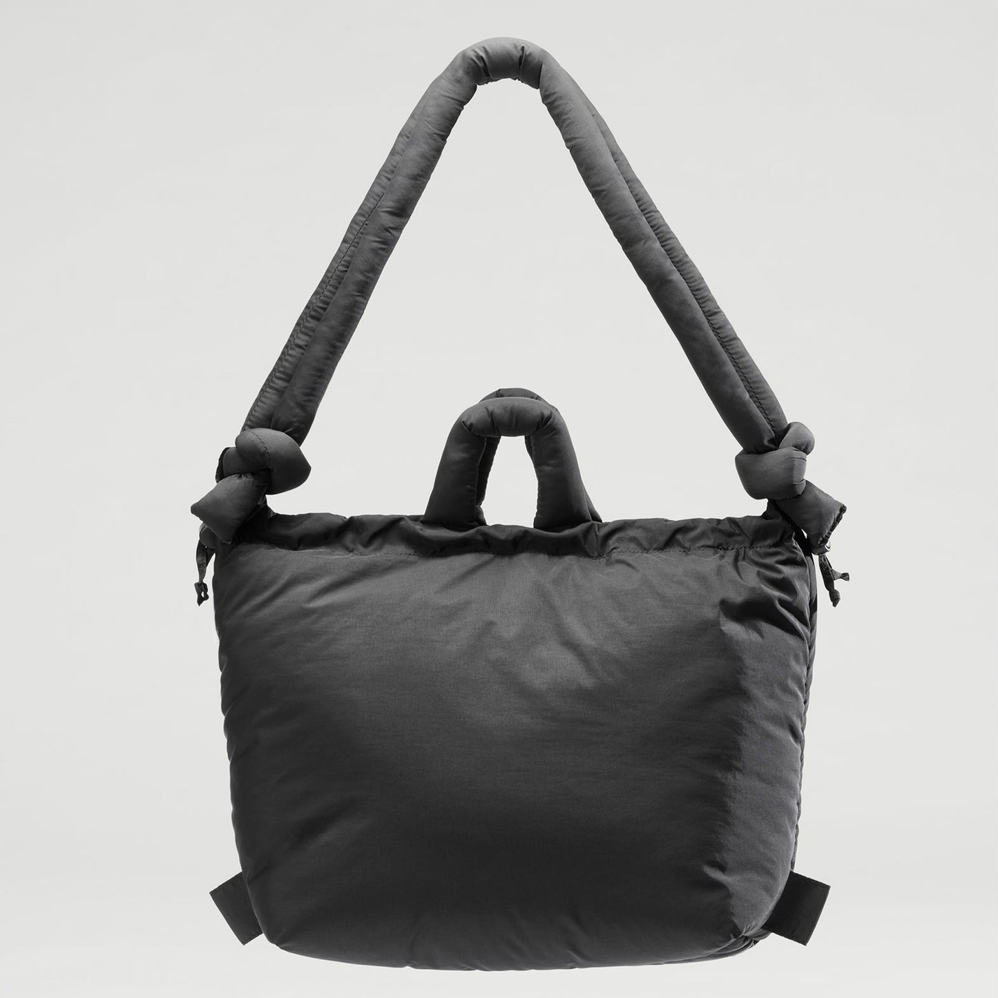 Urban-crossbody-bag-with-stylish-down-jacket-elements-blending-fashion-and-function