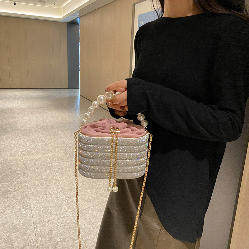Silver-round-crossbody-bag-with-beaded-design
