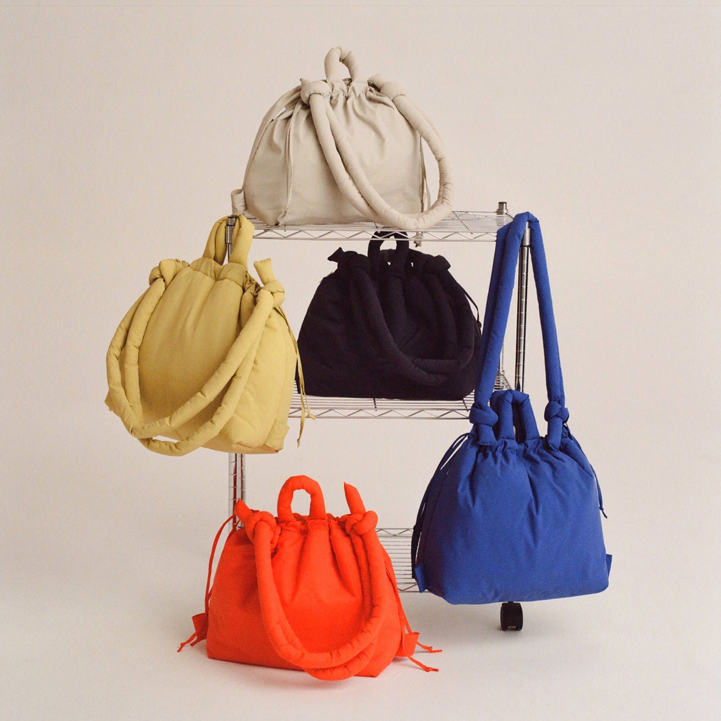 Sleek-black-nylon-crossbody-bag-featuring-a-sandwich-pocket-for-organization