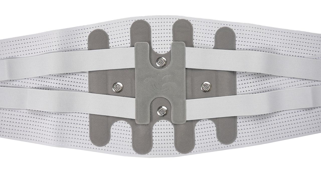 user-demonstrating-armr-back-support-belt-lifting