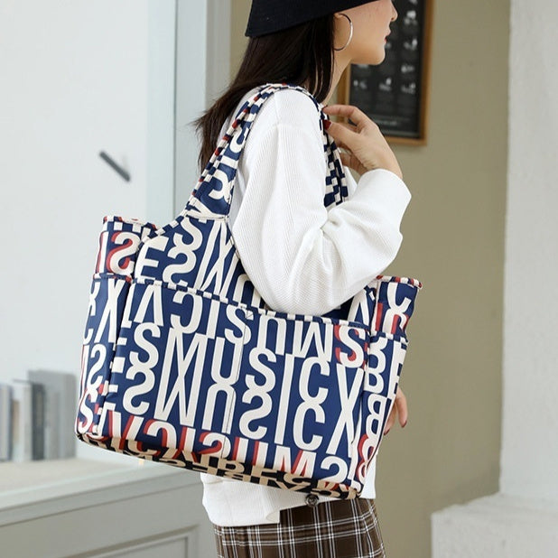 Printed-nylon-shoulder-bag-in-Rabbit-print