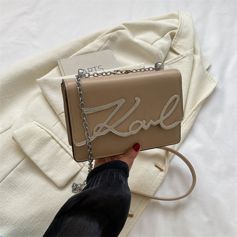 Bold-orange-single-strap-shoulder-bag-for-everyday-wear