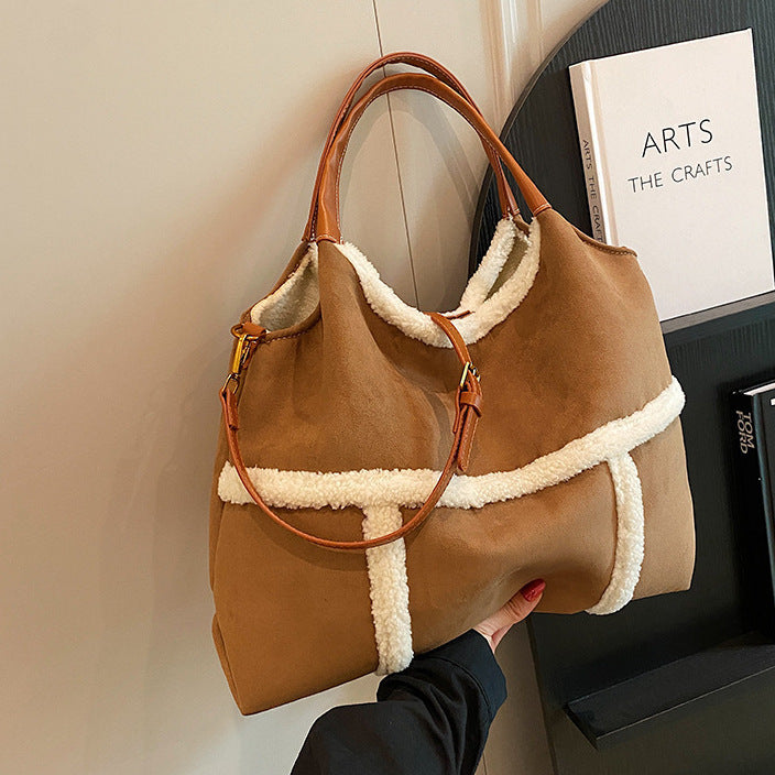 Neutral-colored-suede-tote-bag-with-comfortable-shoulder-straps