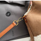 Suede-tote-bag-with-gold-tone-hardware-and-spacious-interior