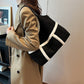 Suede-tote-bag-with-magnetic-snap-closure-and-interior-pockets