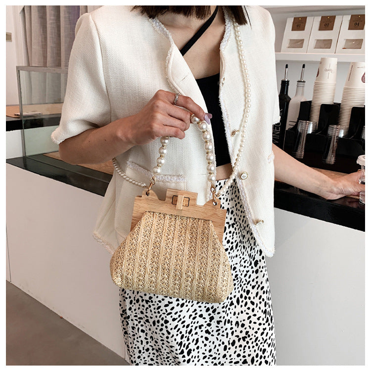 Stylish-straw-bag with-coastal-vibes-and-pearl-accents