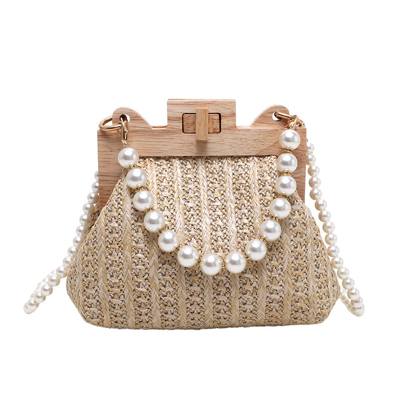 Pearl-embellished-straw-shoulder-bag-for-a-chic-summer-ensemble