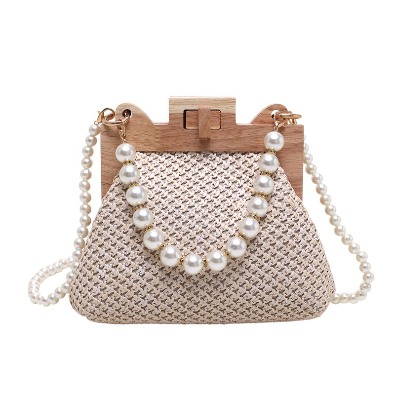 Fashionable-straw-bag-adorned-with-pearls-for-a-coastal-look