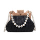 Pearl-accent-straw-shoulder-bag-perfect-for-summer