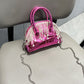 Modern-glossy-handbag-with-diamond-tassel