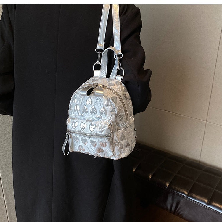 Mcm mini backpack silver best sale