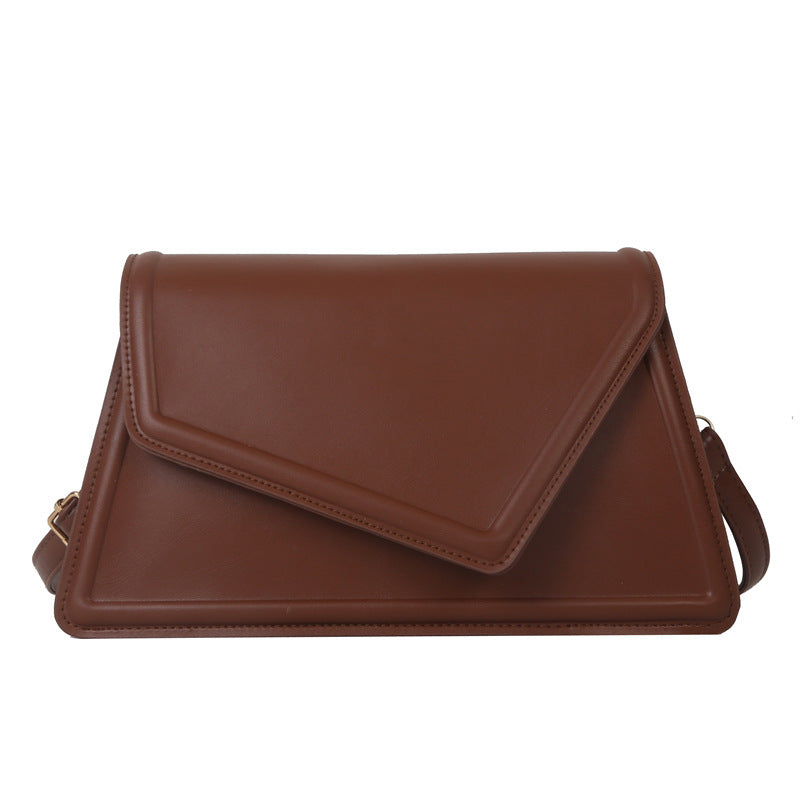 Elegant-solid-color-textured-messenger-bag-for-urban-style