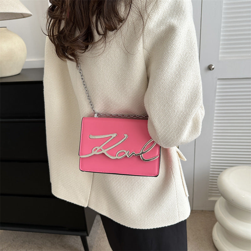 Pink-minimalist-messenger-bag-with-horizontal-square-shape